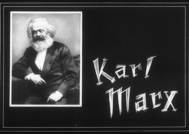 Propaganda slide entitled Karl Marx